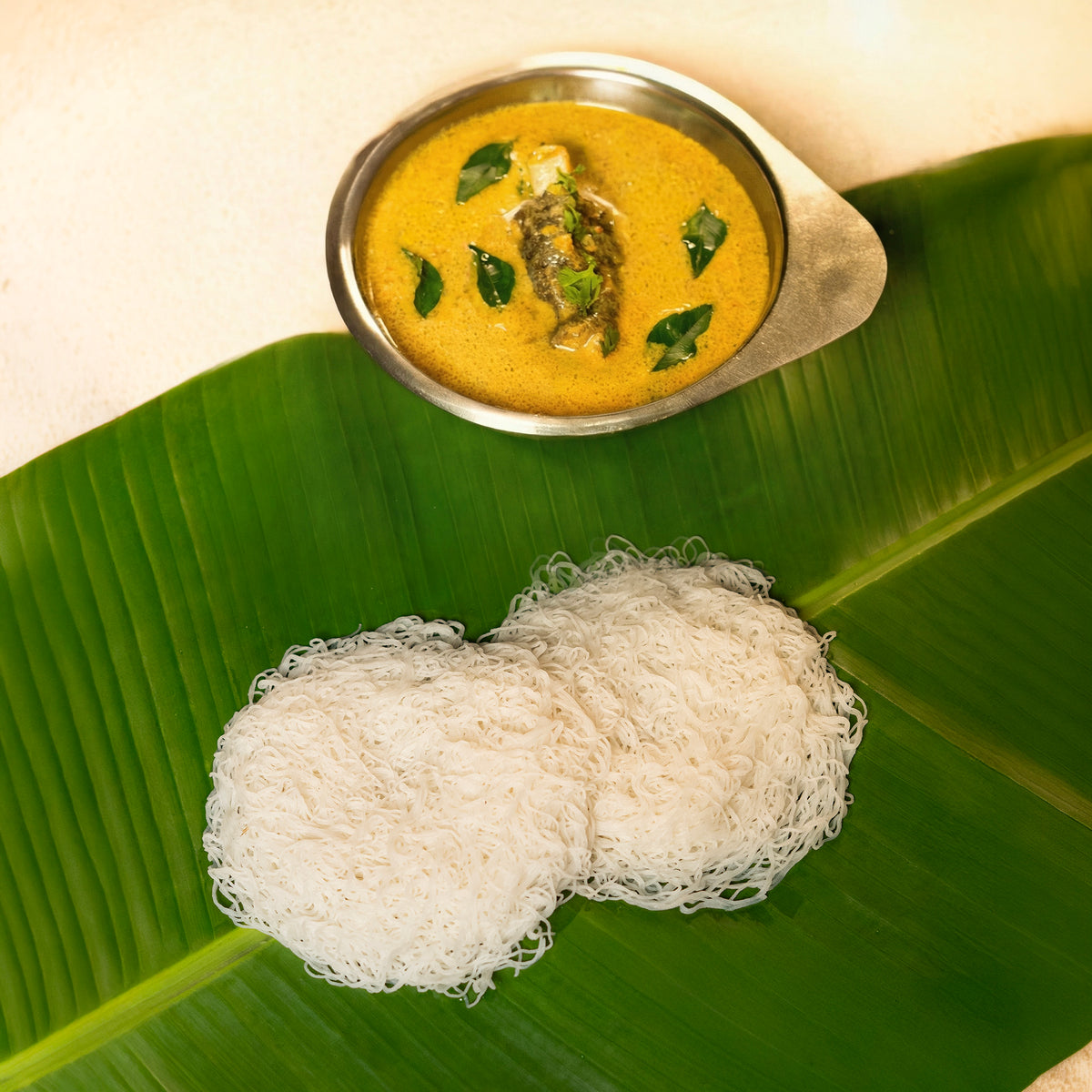 Idiyaapam with Mutton Payaa